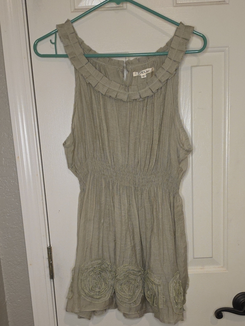 Sleeveless Smocked Waist Tank Top with Rosette Hem in Olive